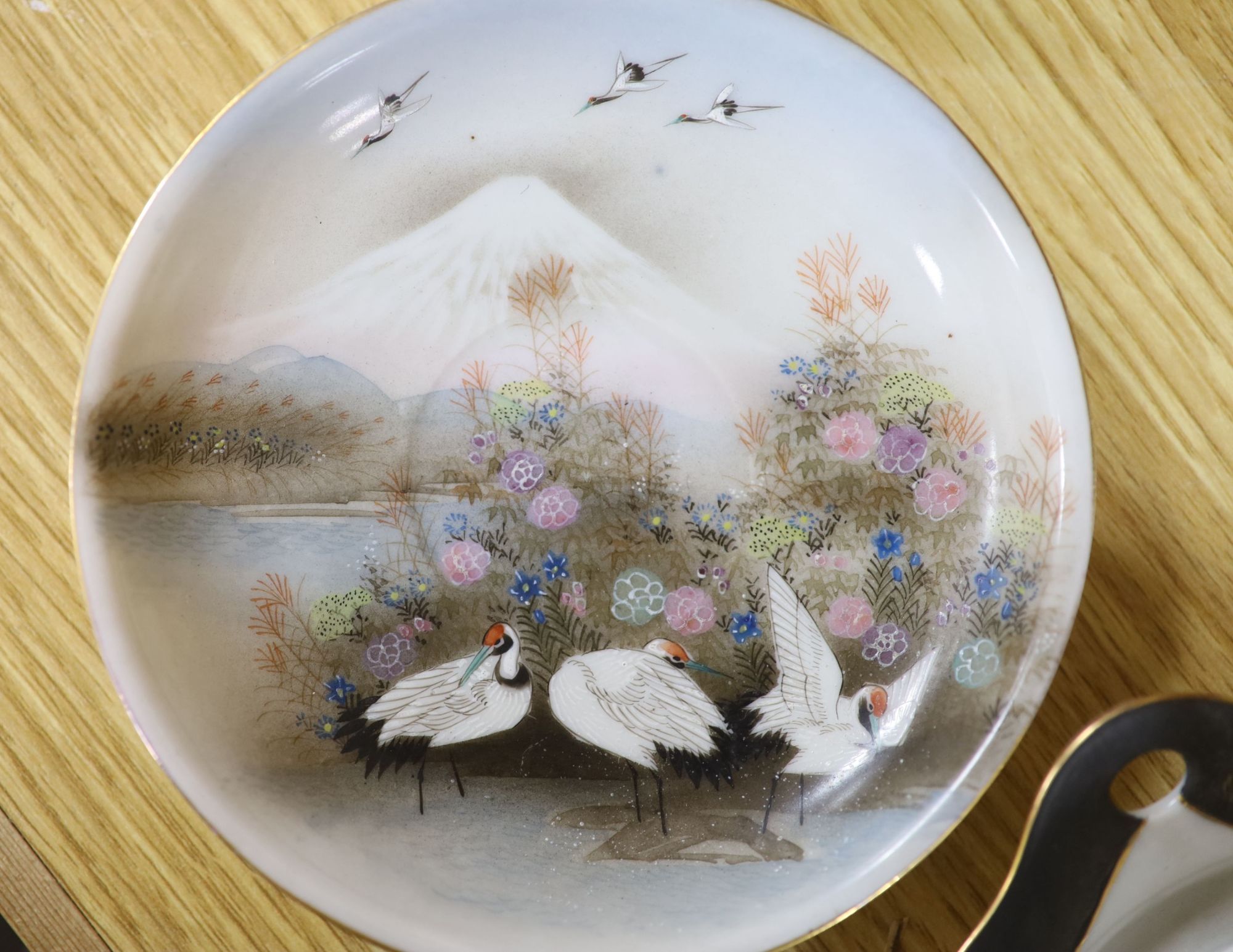 A group of Japanese ceramic teawares and plates, Meiji